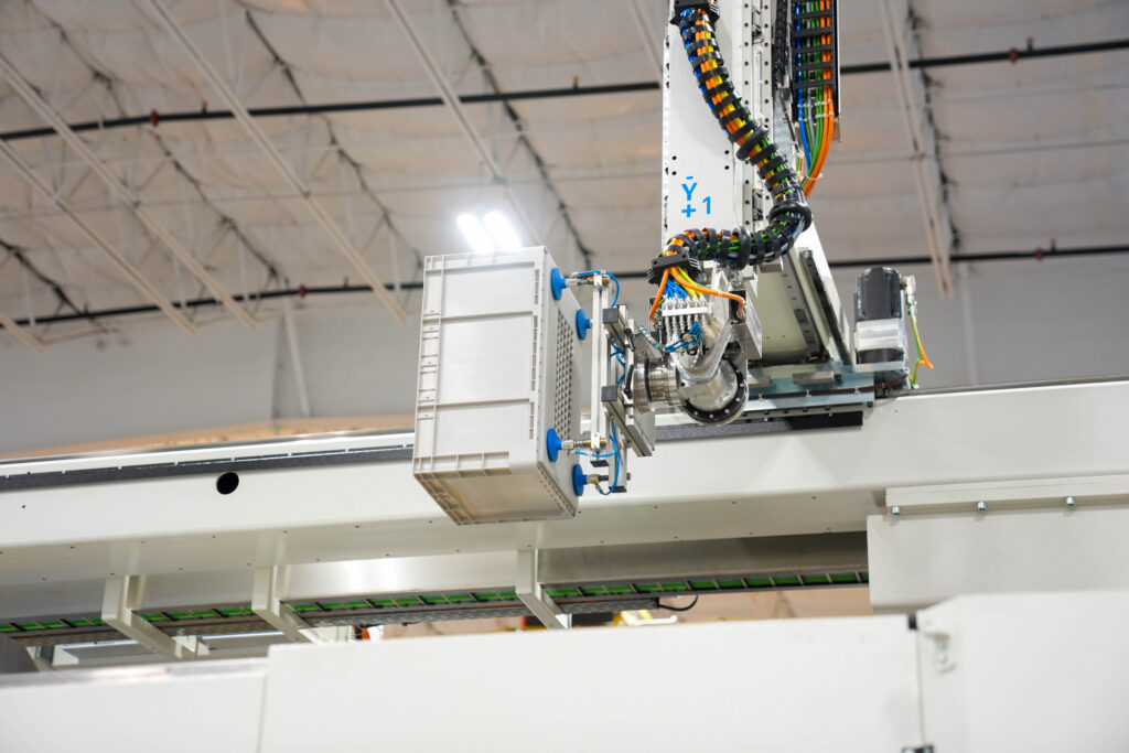 Automation container being moved through production facility.
